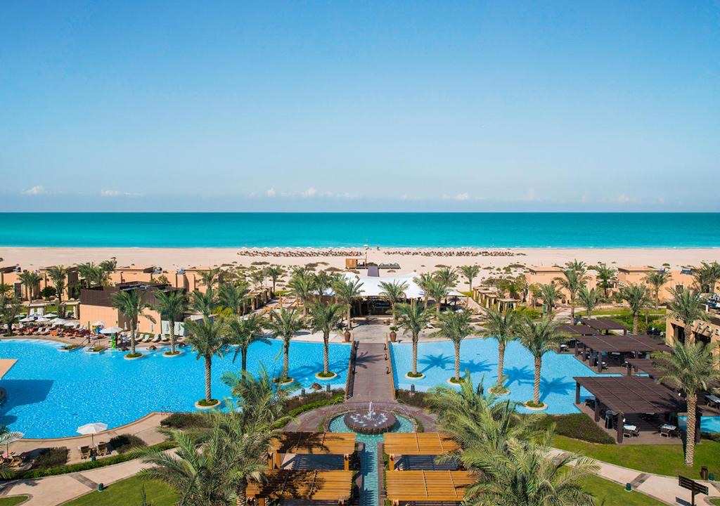 Holiday in Abu Dhabi — resort with pools and beach on Saadiyat Island, on the Persian Gulf.
