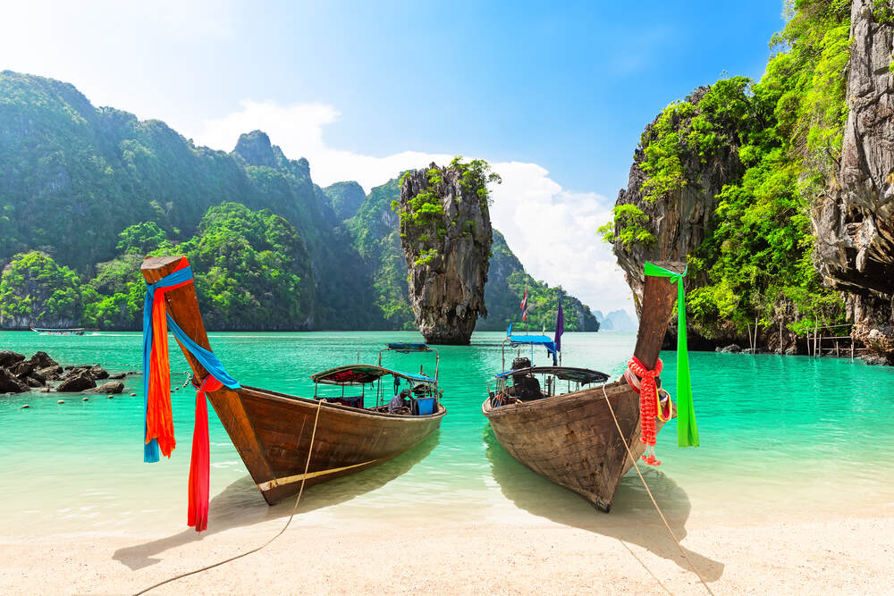 Exotic holiday in Thailand — limestone cliffs and turquoise water in Phuket and Krabi.